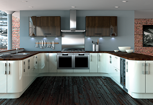 Modern kitchen with white cabinetry, wooden countertops, stainless steel appliances, and a brick backsplash under dim lighting.