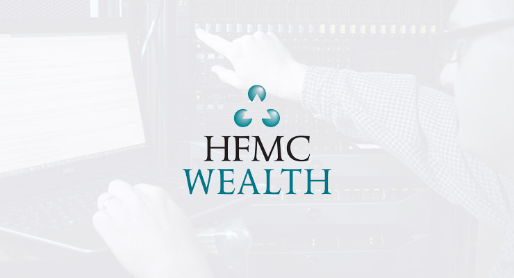 The HFMC Wealth logo is overlaid on a faint background showing a person working on a laptop and pointing at equipment in a server room, illustrating an IT Support Case Study.