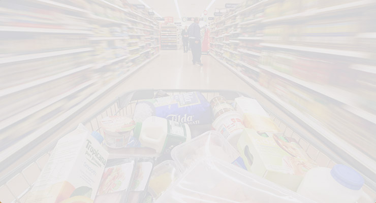 View from behind a shopping trolley filled with groceries in a supermarket aisle, reminiscent of navigating the shelves during a Windows XP migration, with shoppers and products lining both sides.