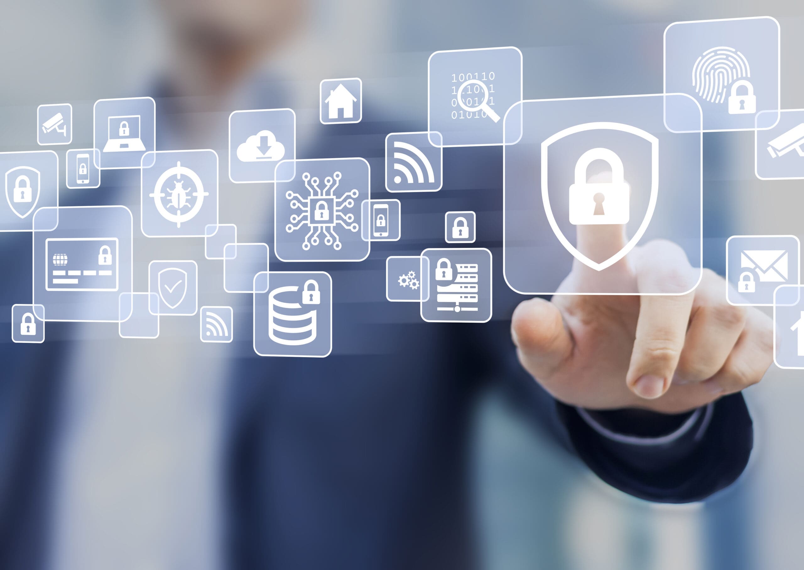 A person interacting with a futuristic digital interface featuring various cybersecurity icons, including vulnerability management. 