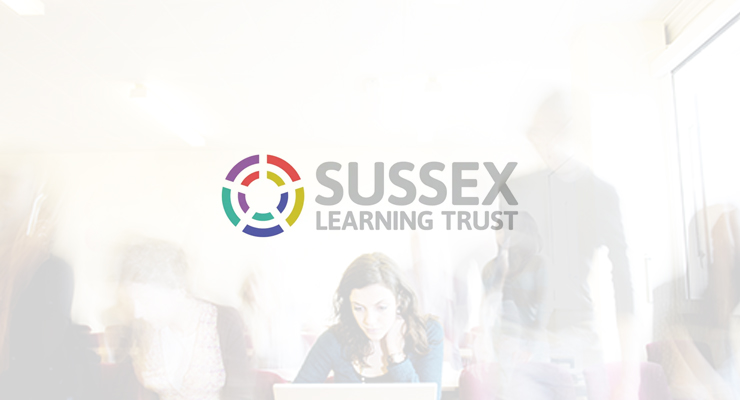 Sussex Learning Trust logo overlaid on a blurred image of people in a bright, indoor setting featuring an Optoma Interactive Display screen for school.