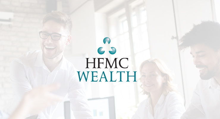 Three people sit and smile in a bright office setting, with the HFMC Wealth logo and name displayed prominently in the center—perfect for teams migrating from Office 365 or seeking seamless office 365 data migration solutions.