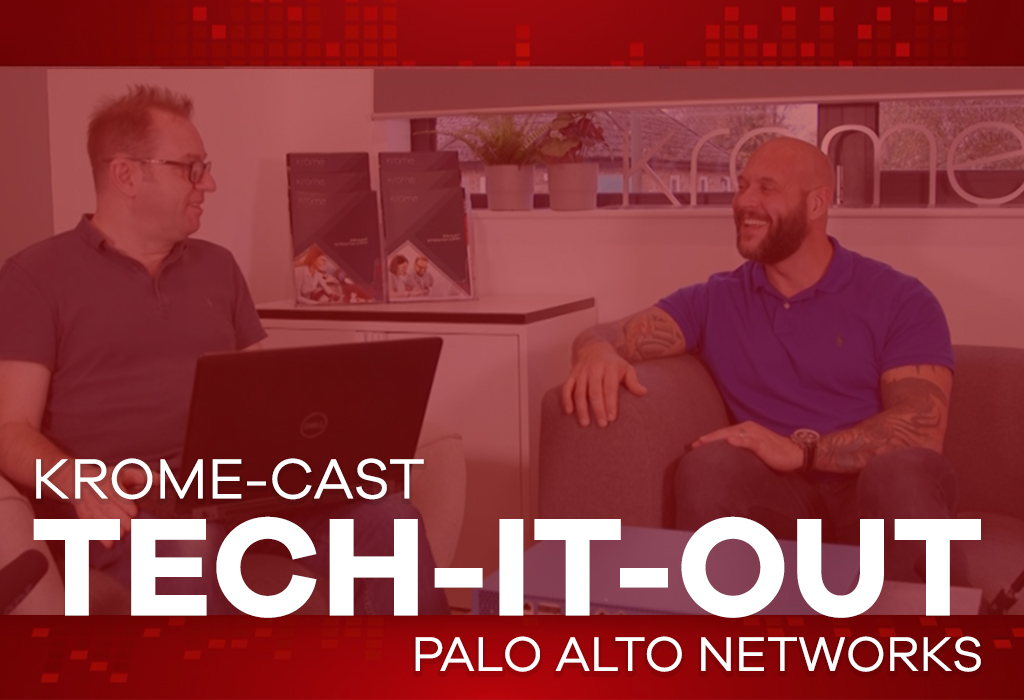 Two men in conversation, one with a laptop, in an office setting overlayed with text "krome-cast tech-it-out, Palo Alto firewall" and a red tint.