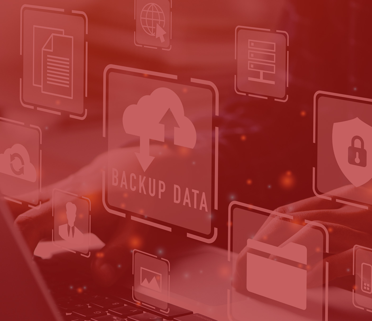 Hands typing on a laptop with digital icons overlaid, including a cloud labeled "BACKUP DATA," representing data backup and cybersecurity concepts—perfect for illustrating the Tech Drop-In Masterclass.