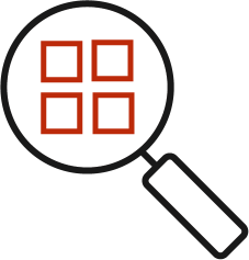 A magnifying glass focusing on four red squares, representing the Microsoft logo.